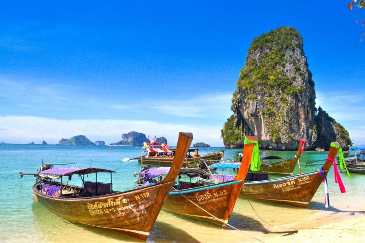 Boats at beach in Thailand