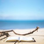 Open book on beach