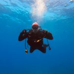 Scuba diver guide underwater
