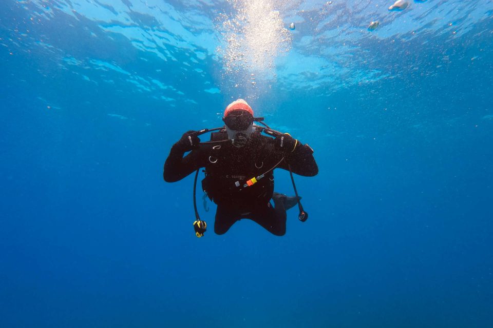 Scuba diver guide underwater