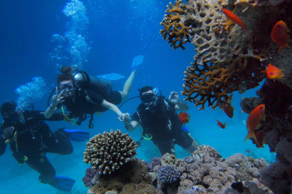 Dive instructor with students