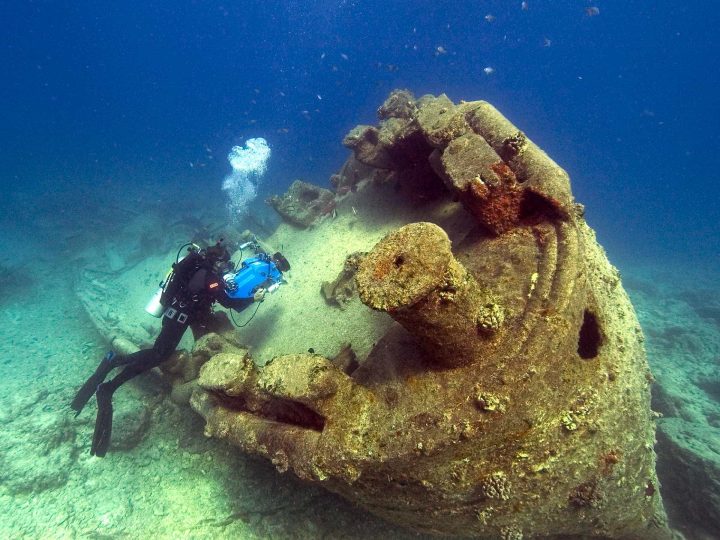 Europa 8 Scuba diver filming wreck underwater
