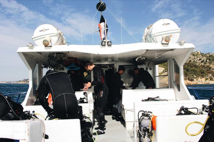 Divers preparing on boat