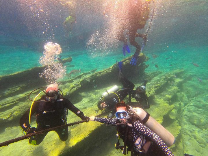 Family Dive Leader 8 Group of divers during safety stop