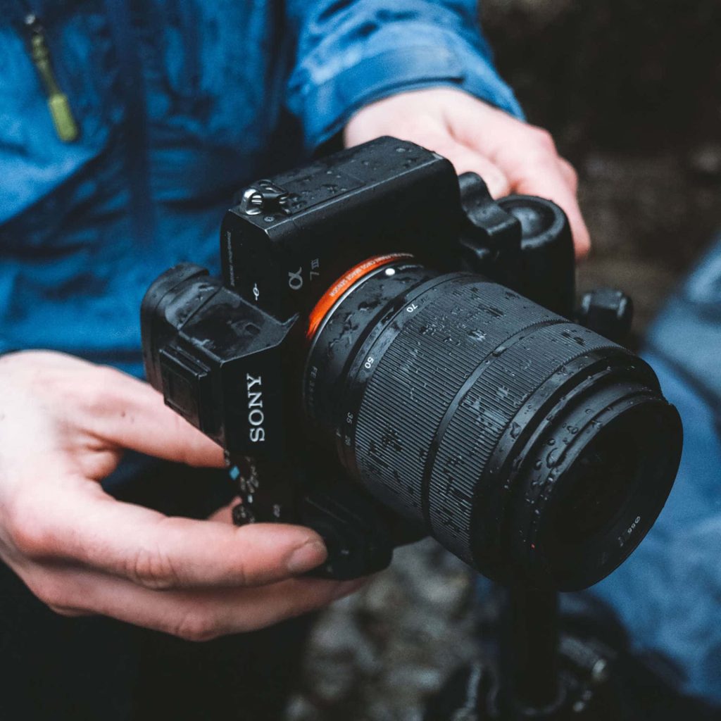 Hands holding Sony A7 Mk II