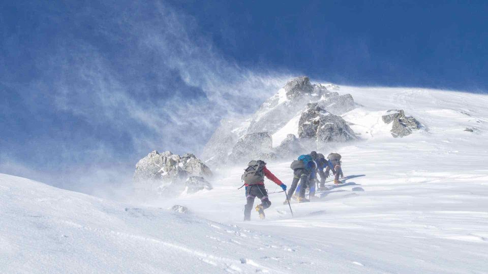 Mountain climbers on snowy mountain