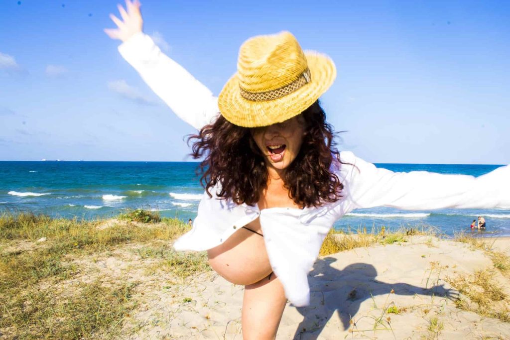 Pregnant woman at beach