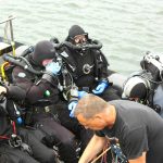 Group of rebreather divers on boat
