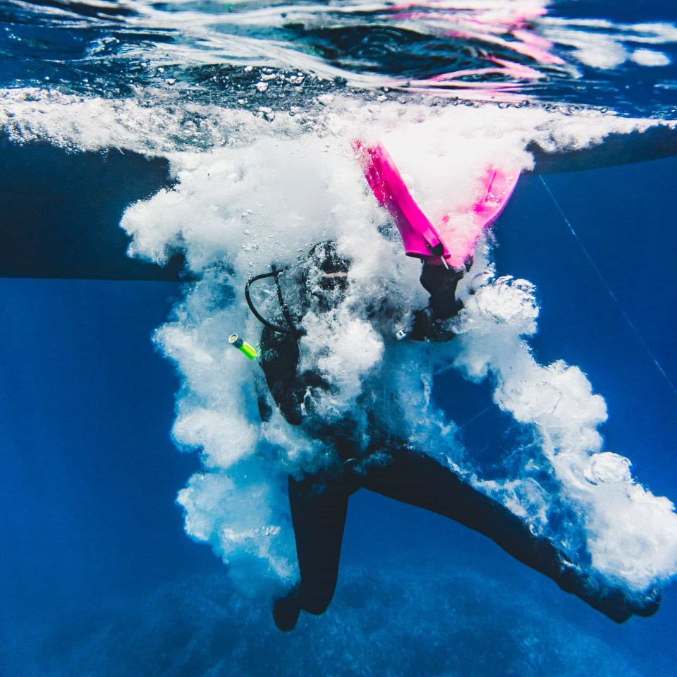 Scuba diver jumping from boat