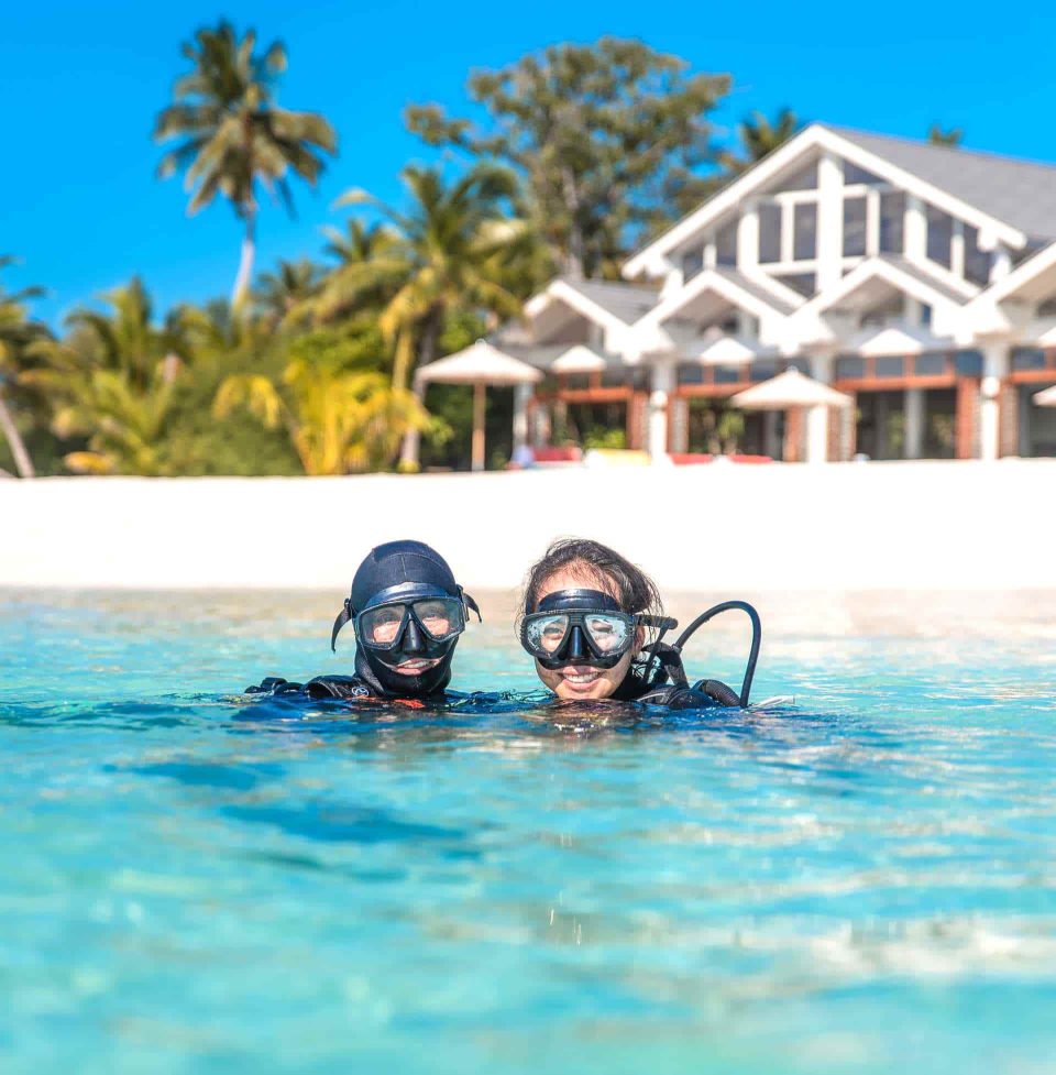 Scuba divers at beach