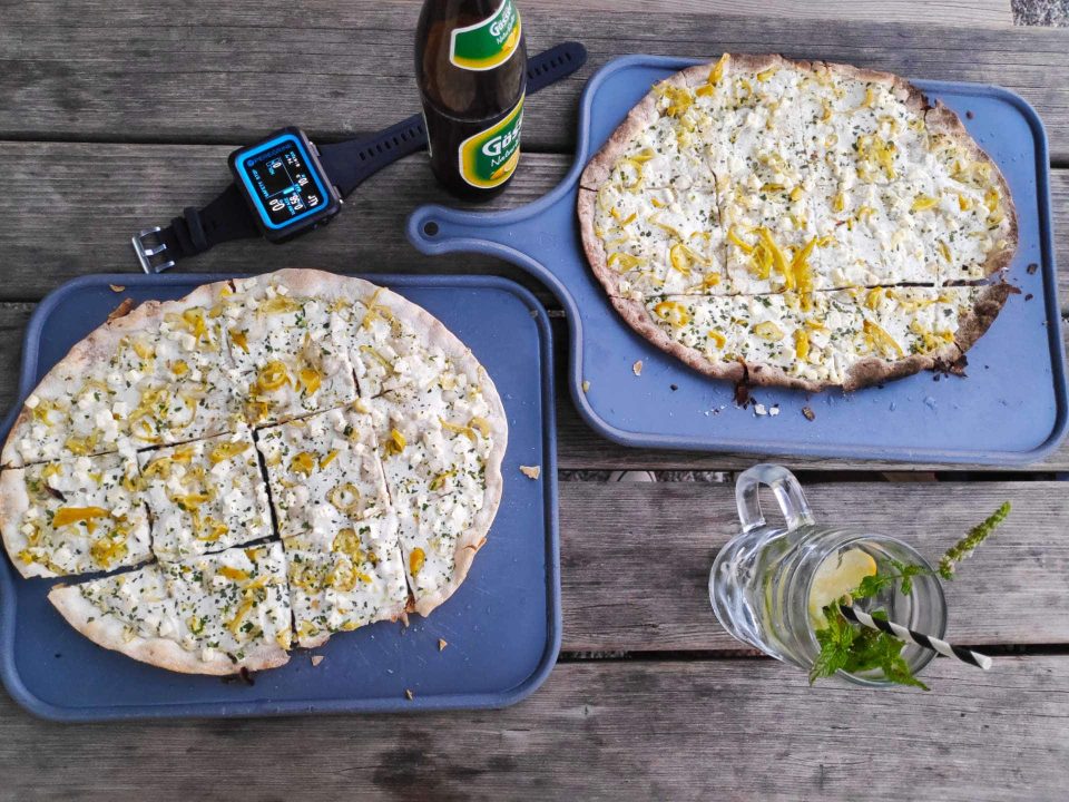 Shearwater Peregrin on table next to Flammkuchen dish