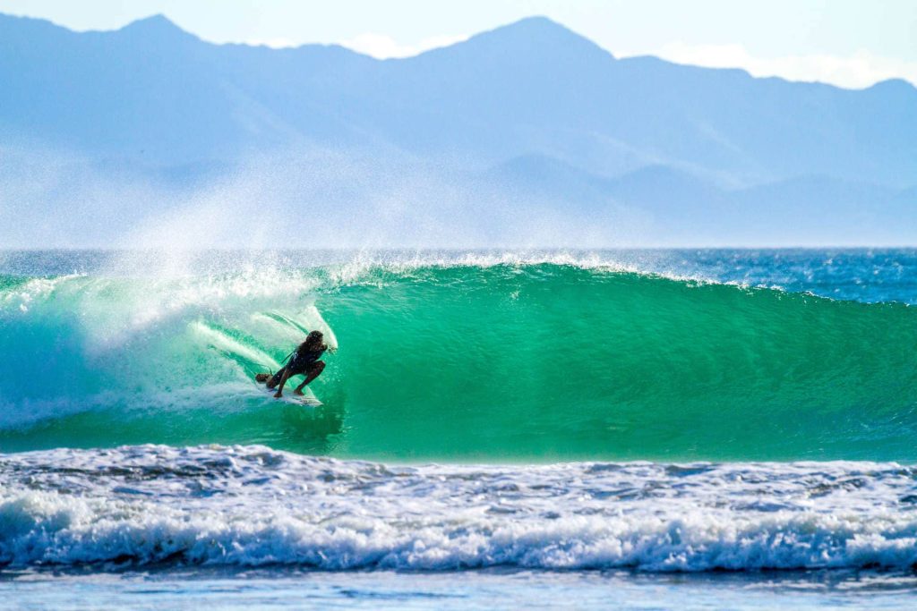 Surfing on wave in Nicaragua