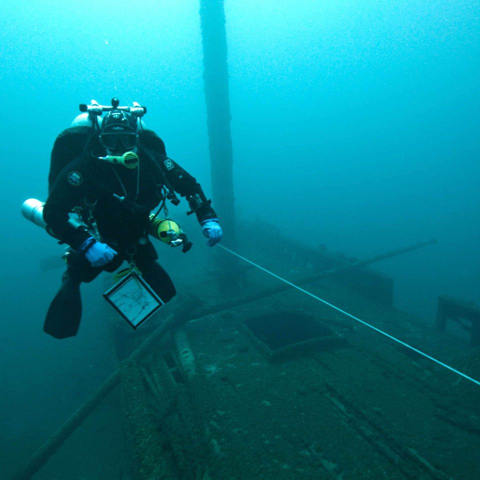 Tech diver doing line drill on wreck
