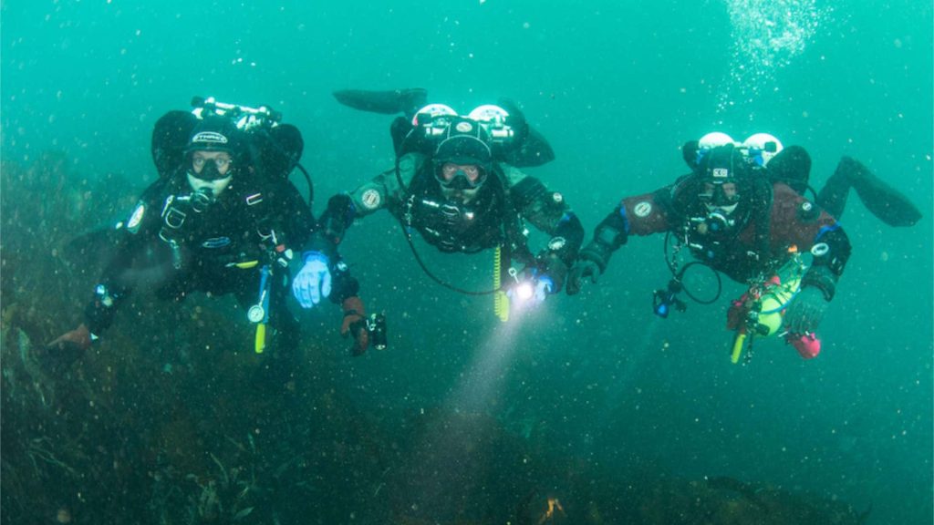 Technical divers practicing buoyancy